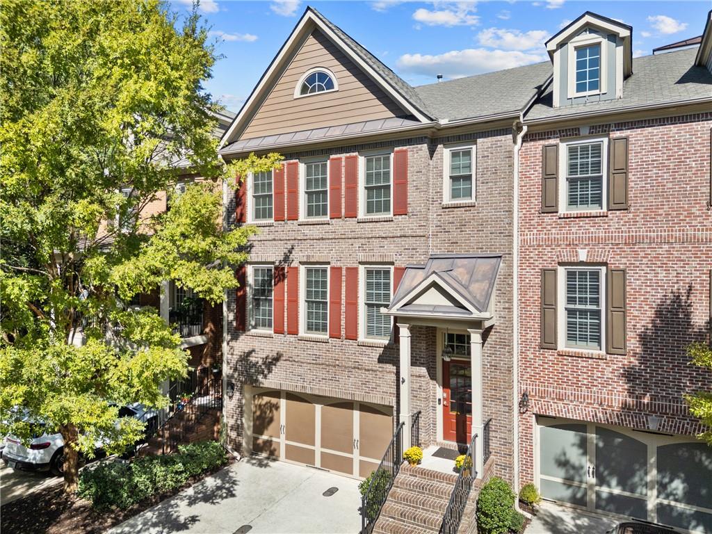 2015 Eagle Ridge Roswell, GA 30076 - Photo 37 of 47 a front view of a house with a yard