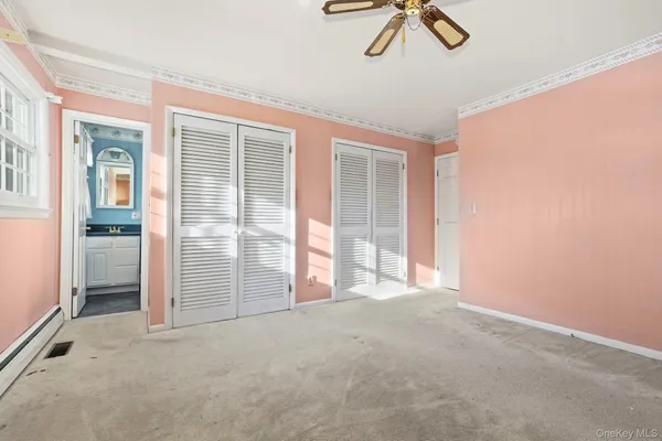 a view of a hallway with windows