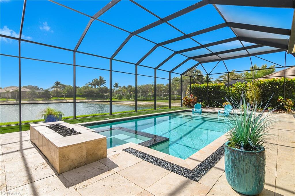 14852 Dockside Lane Naples, FL 34114 - Photo 27 of 49 a view of a backyard with sitting area