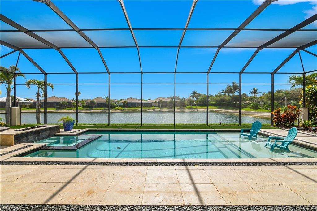 14852 Dockside Lane Naples, FL 34114 - Photo 28 of 49 a view of yard with outdoor seating