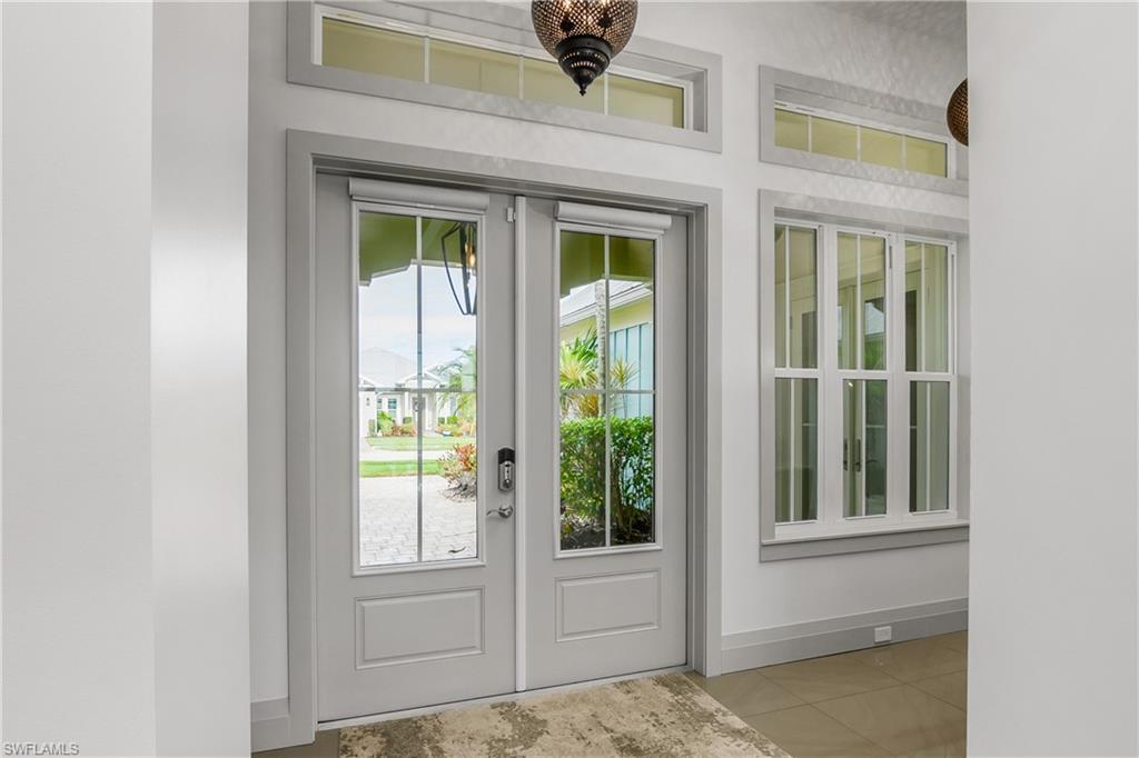 14852 Dockside Lane Naples, FL 34114 - Photo 34 of 49 a view of front door