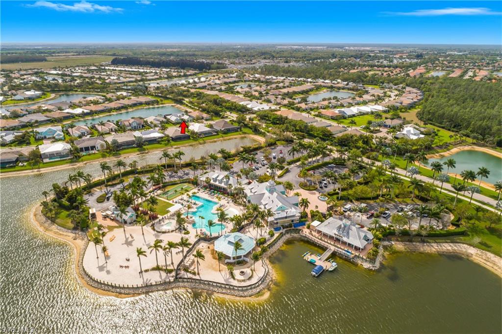 14852 Dockside Lane Naples, FL 34114 - Photo 42 of 49 an aerial view of residential houses with outdoor space