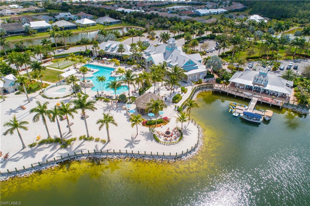 14852 Dockside Lane Naples, FL 34114 - Photo 45 of 49 an aerial view of residential houses with outdoor space