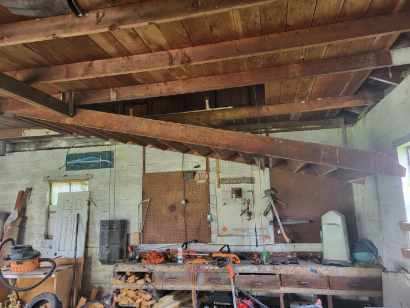 237 North Main Street Roberts, IL 60962 - Photo 3 of 11 a room with lots of furniture and clutter