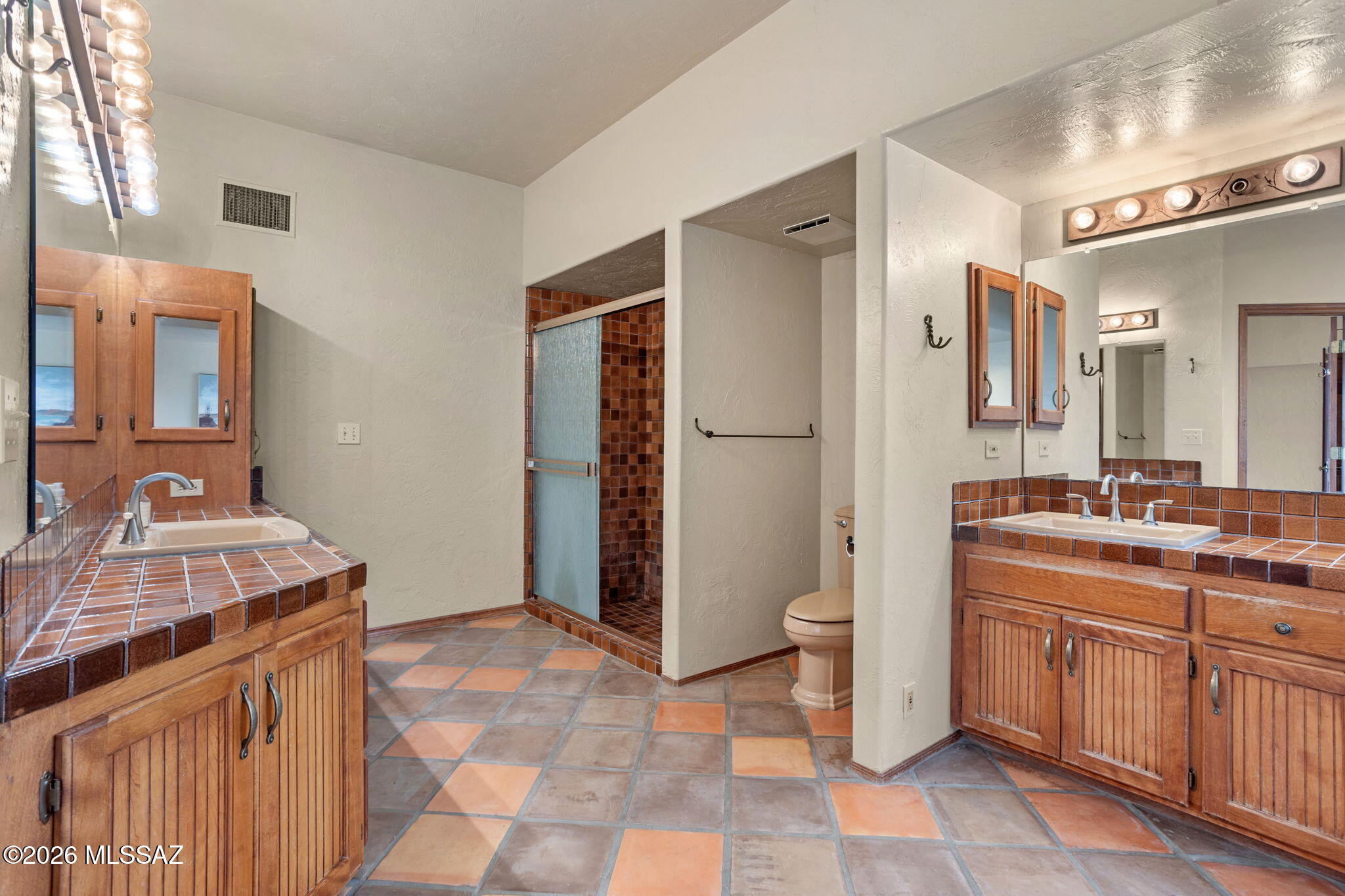 7171 South X9 Ranch Road Vail, AZ 85641 - Photo 20 of 50 Dual vanities, tiled counters, full shower