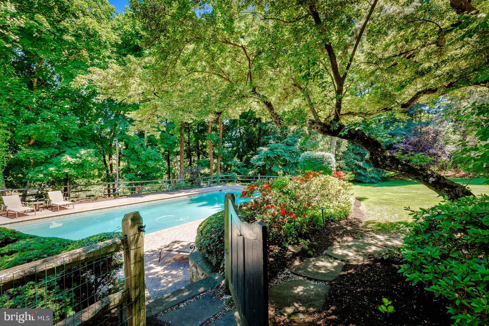 1700 Old Welsh Road Huntingdon Valley, PA 19006 - Photo 64 of 105 a view of a yard with plants and large trees
