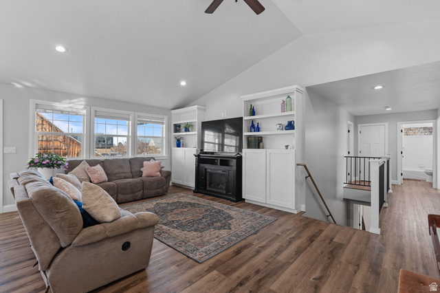 75 North 100th Street West Fillmore, UT 84631 - Photo 7 of 62 Living area with vaulted ceiling, wood finished floors, healthy amount of natural light, recessed lighting, and a ceiling fan