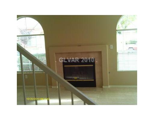10215 Rising Tree Street Las Vegas, NV 89183 - Photo 3 of 10 Living Room. WONDERFUL LIGHT FILLED ROOM