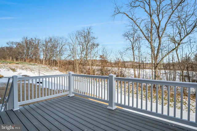 a view of a wooden roof deck