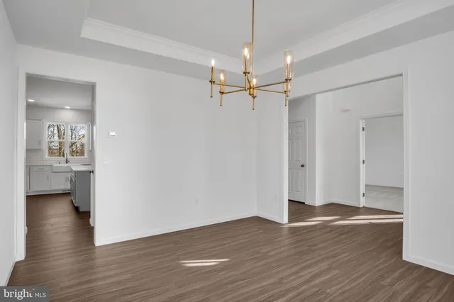 a view of a livingroom with wooden floor
