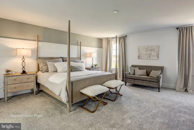 a bedroom with furniture and a bed