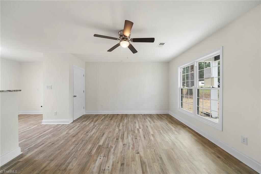 5001 Royal Acres Road Raleigh, NC 27610 - Photo 11 of 29 Den and Living Area