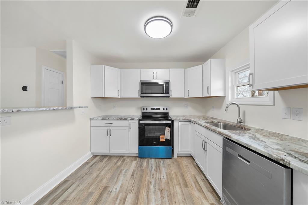 5001 Royal Acres Road Raleigh, NC 27610 - Photo 14 of 29 Kitchen - New cabinets, Appliances, and Granite Counters