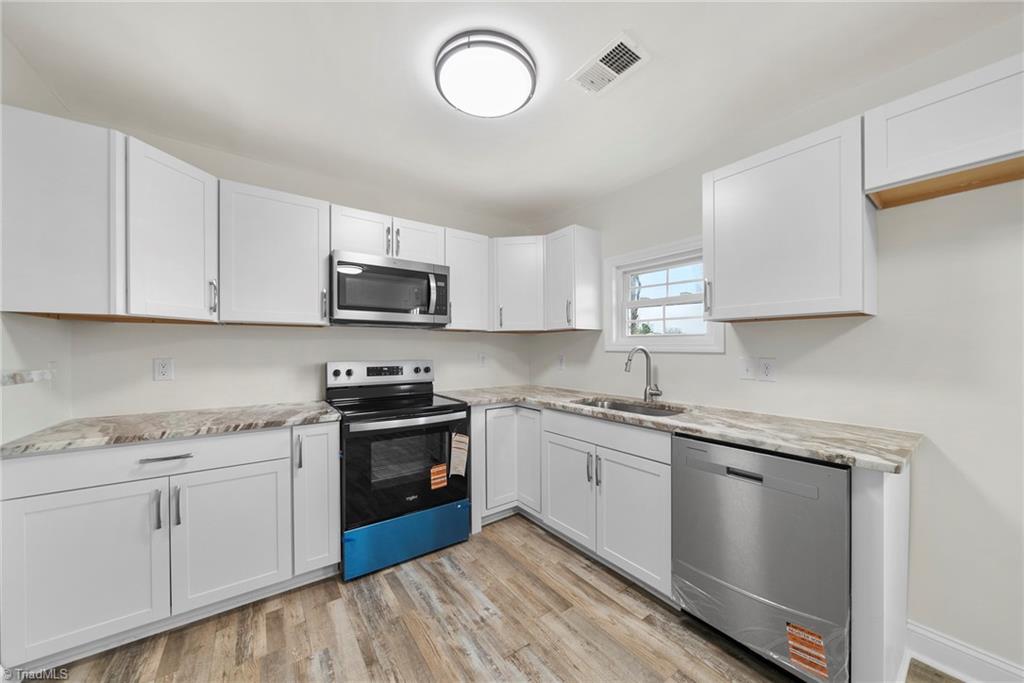 5001 Royal Acres Road Raleigh, NC 27610 - Photo 15 of 29 Kitchen - New cabinets, Appliances, and Granite Counters