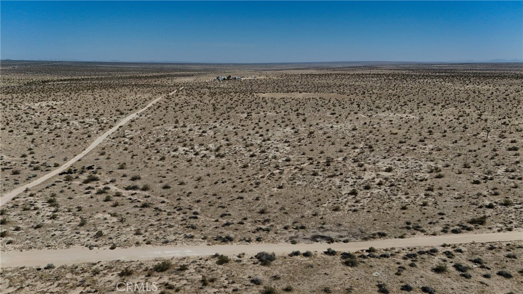 745 White Bird Road Adelanto, CA 92301 - Photo 6 of 10 Red boundary lines on pictures are an estimate and for marketing purposes only. Buyer to verify all aspects of this property including, but not limited to utilities, assessments, boundaries, usage, access, and zoning to satisfy themselves.