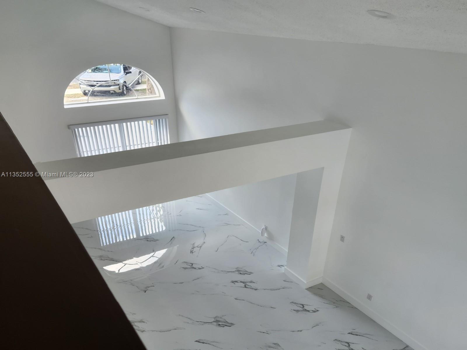 11111 Southwest 147th Court Miami, FL 33196 - Photo 13 of 20 a view of wooden floor