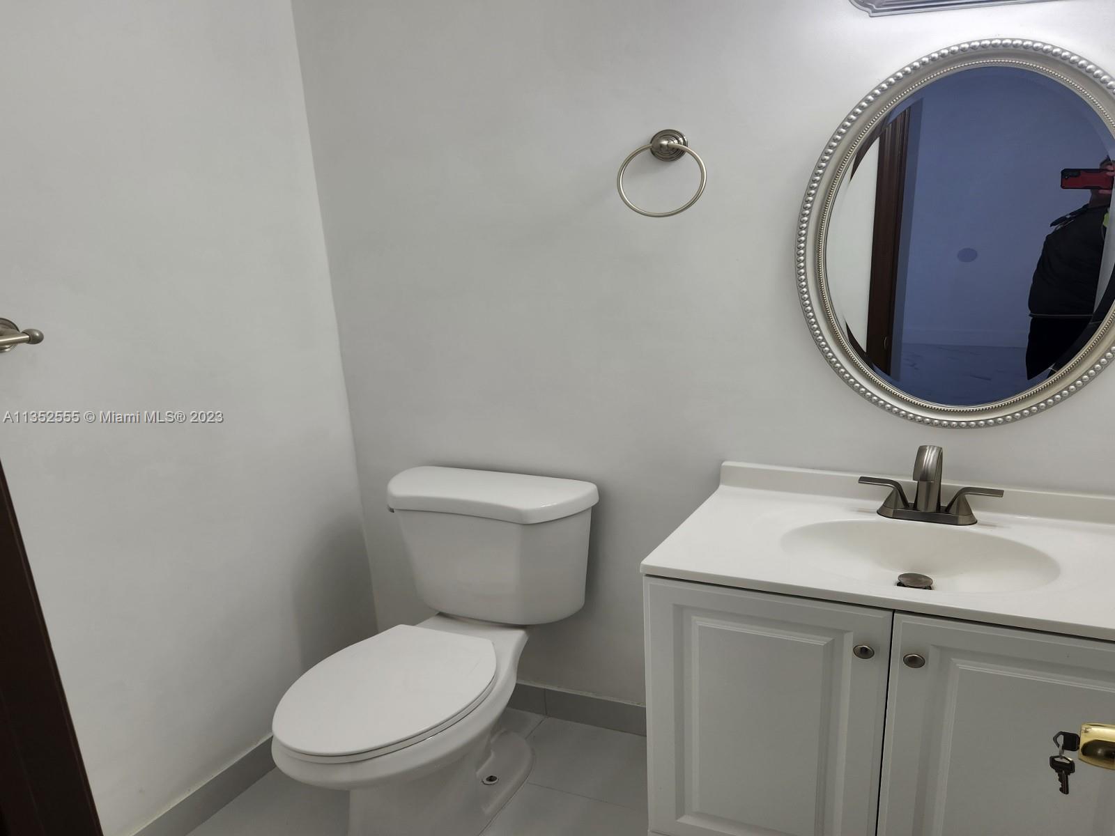 11111 Southwest 147th Court Miami, FL 33196 - Photo 20 of 20 a bathroom with a sink and a toilet