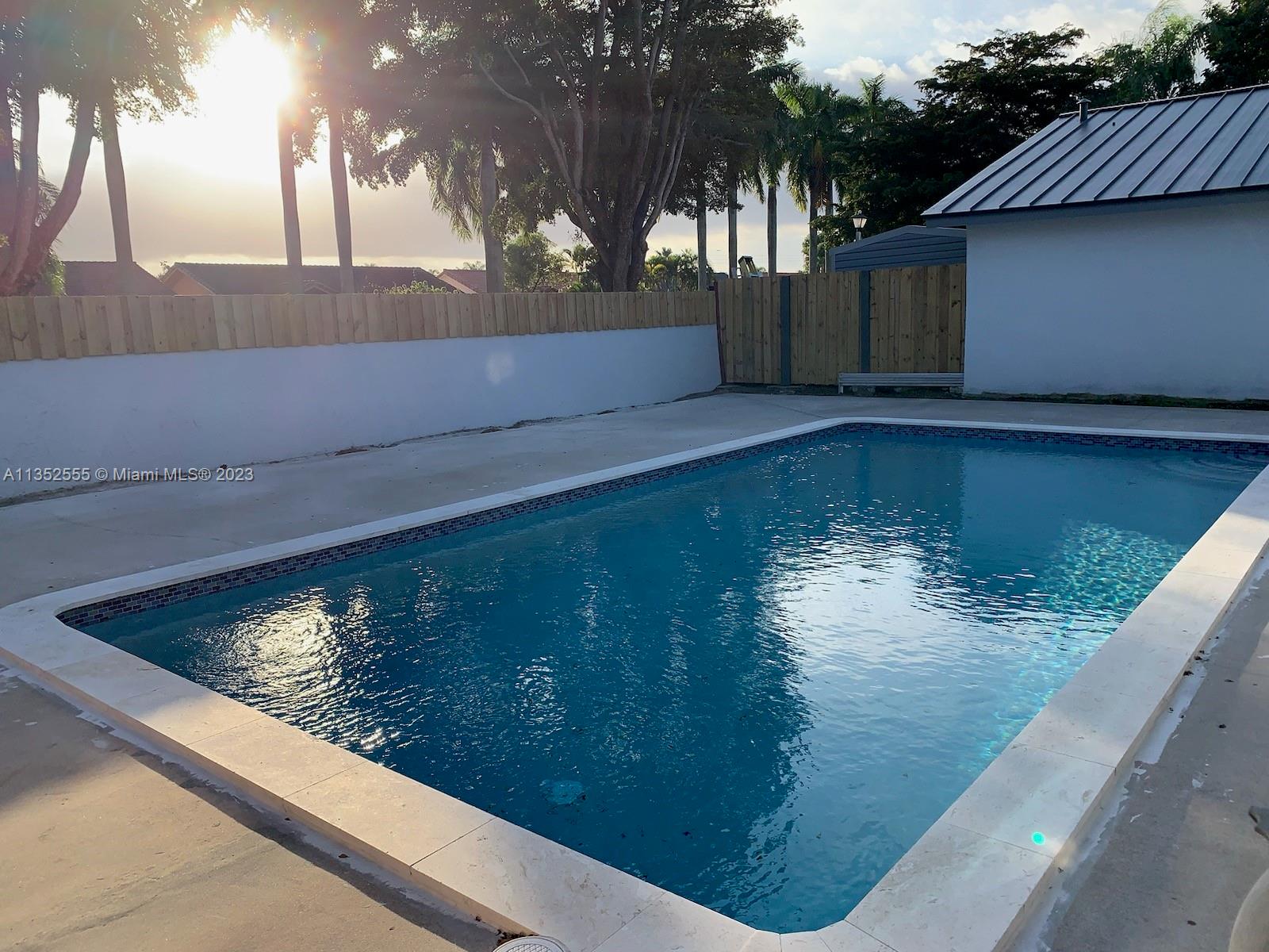 11111 Southwest 147th Court Miami, FL 33196 - Photo 4 of 20 a view of swimming pool from a balcony