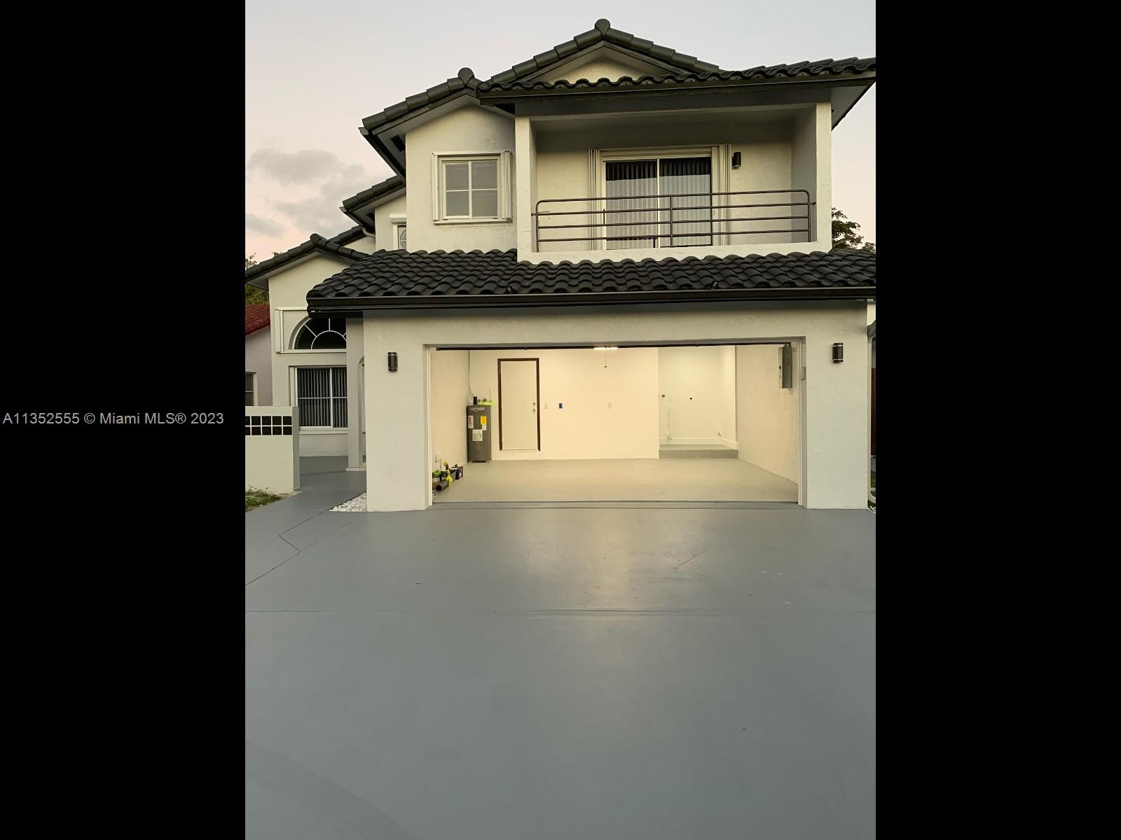 11111 Southwest 147th Court Miami, FL 33196 - Photo 5 of 20 a view of a house with a window
