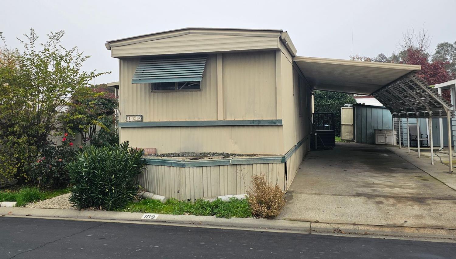 8665 Florin Road, Unit 109 Sacramento, CA 95828 - Photo 1 of 18 a view of a house with a street