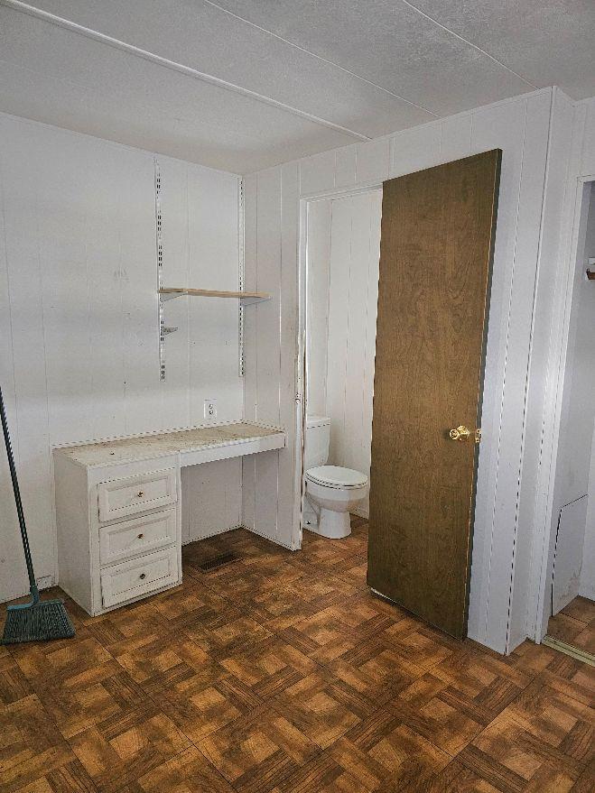 8665 Florin Road, Unit 109 Sacramento, CA 95828 - Photo 13 of 18 a room with a dresser and a window