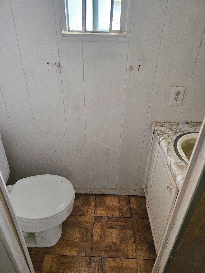 8665 Florin Road, Unit 109 Sacramento, CA 95828 - Photo 14 of 18 a bathroom with a toilet and a sink