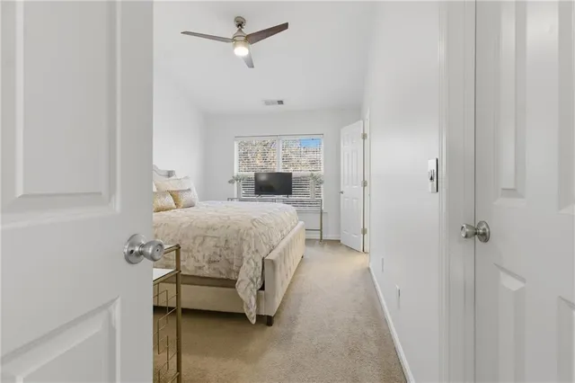 a bedroom with a bed and closet