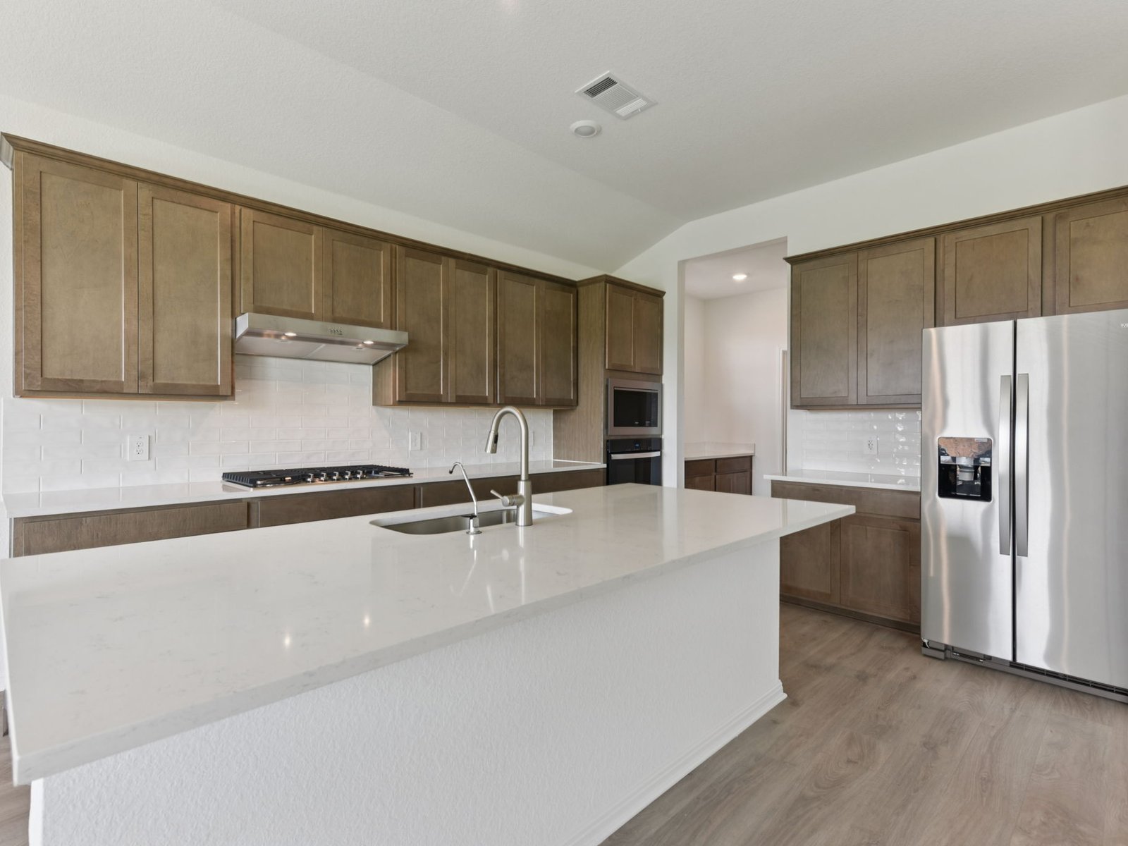 104 Pendleton Drive Kyle, TX 78640 - Photo 5 of 10 Photo is not of the actual home, but is an inspirational photo of builder’s model home and may depict options, furnishings, and/or decorator features that are not included