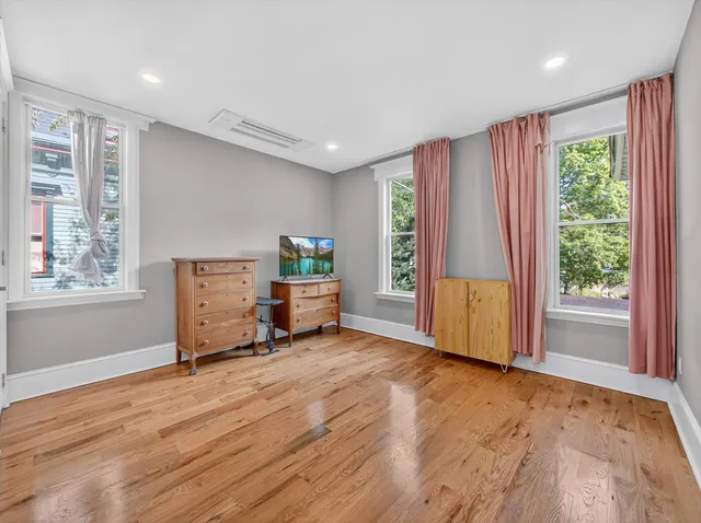 a view of livingroom with furniture and window