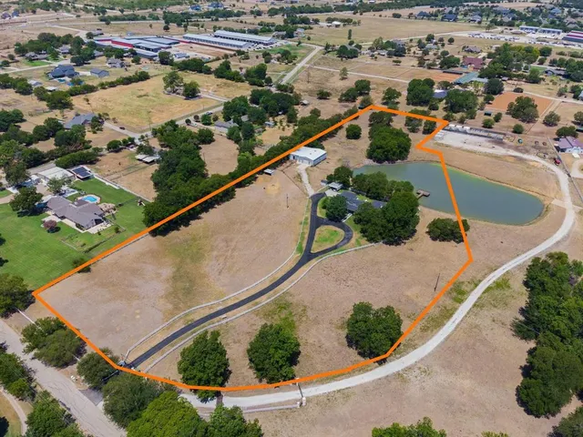 a living room with furniture and white walls