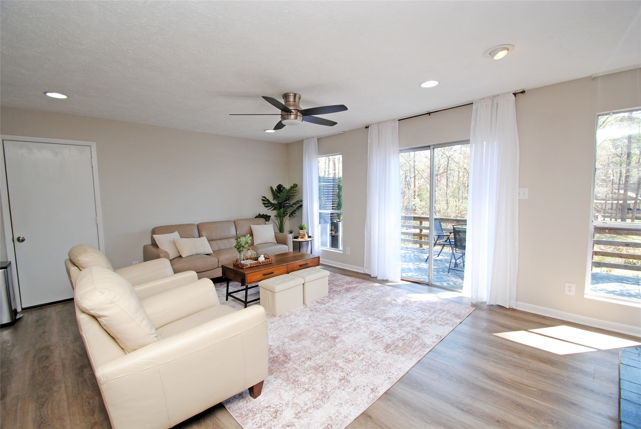 59 Paradise Loop Point Blank, TX 77364 - Photo 11 of 41 This light and bright living room is perfect for entertaining.