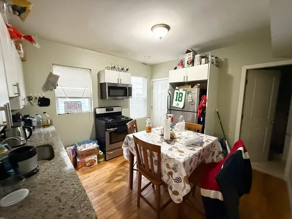 a view of a dining room with furniture