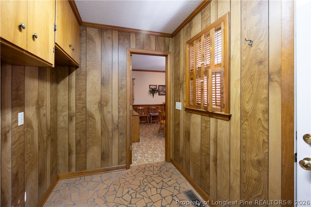5424 Bonnetsville Road Clinton, NC 28328 - Photo 13 of 29 a view of a hallway with a dining area