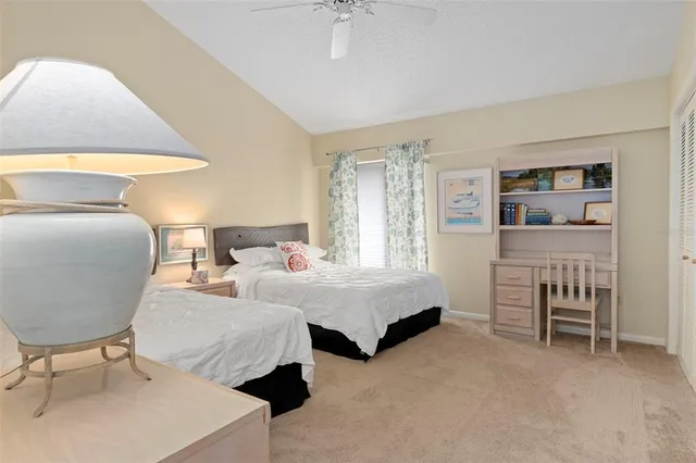 a bedroom with two beds and painted walls