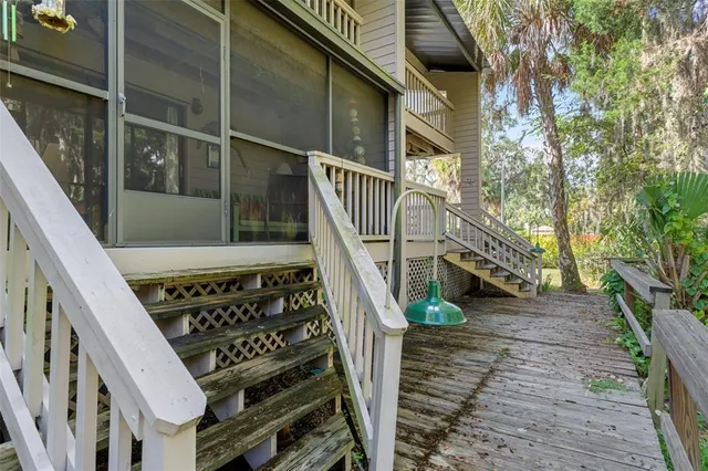 a view of balcony and yard