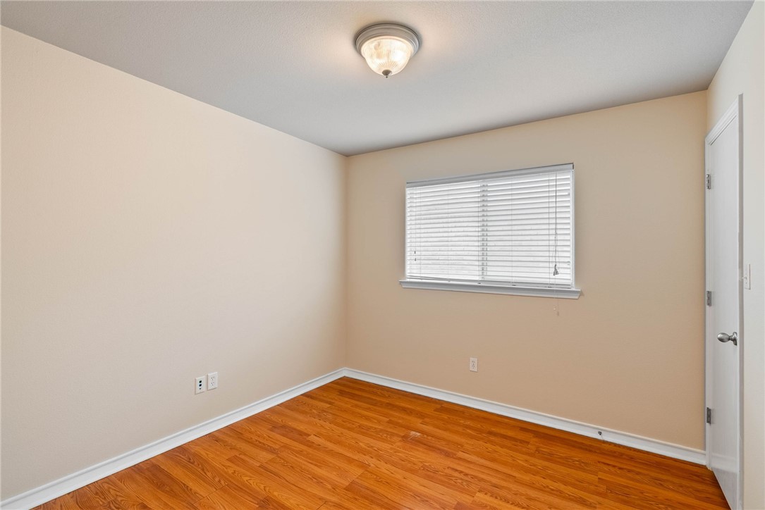 6606 Riding Wind Drive Corpus Christi, TX 78414 - Photo 12 of 15 an empty room with a window
