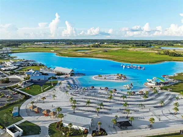 an aerial view of a house with a swimming pool