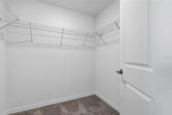 a view of a room with racks on the wall