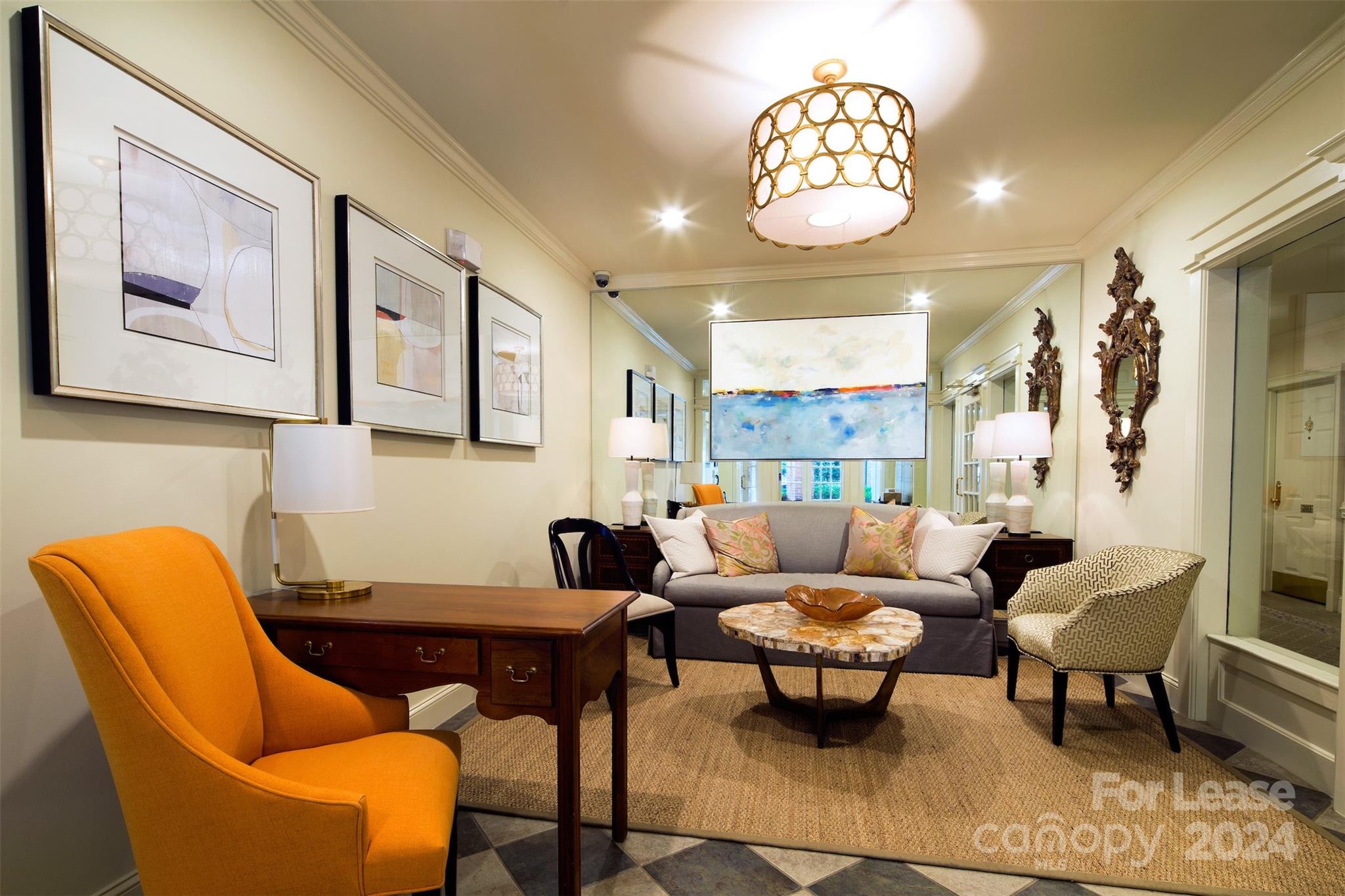 1301 Queens Road, Unit 205 Charlotte, NC 28207 - Photo 6 of 23 a living room with furniture a chandelier and a window