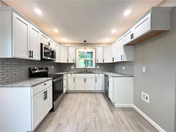 $350,000 | 718 Northeast Mulberry Street, Lee's Summit, MO 64086