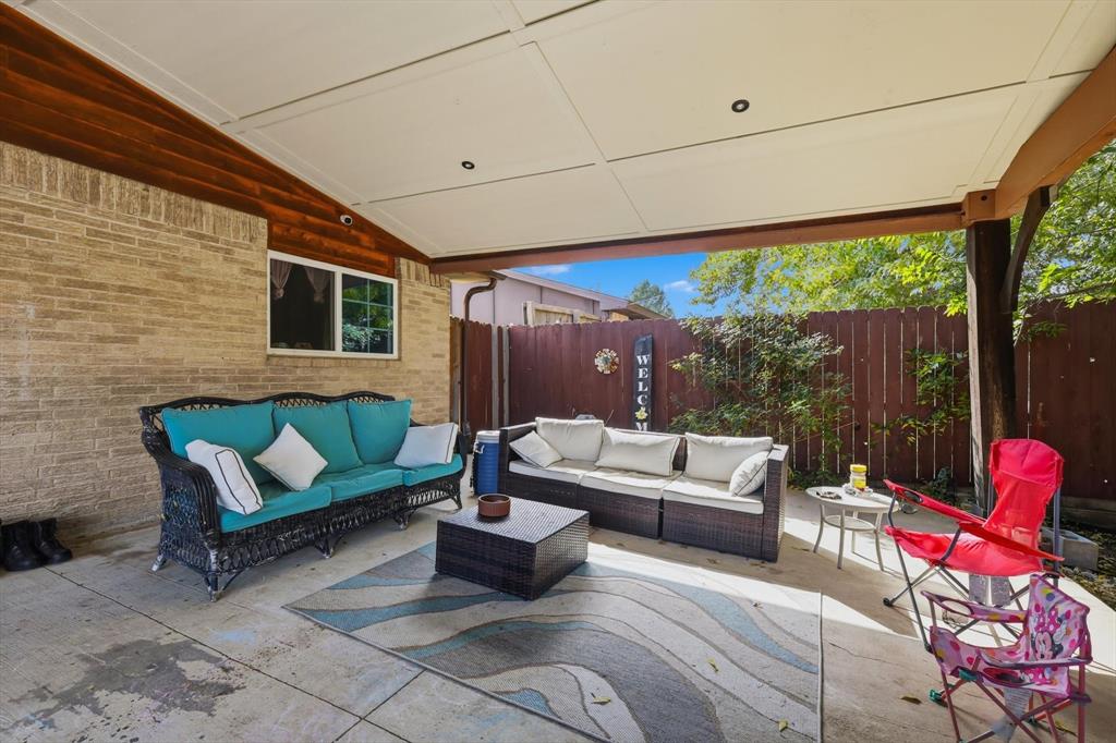 6317 Locust Street Rowlett, TX 75089 - Photo 24 of 40 a outdoor living space with furniture and garden view