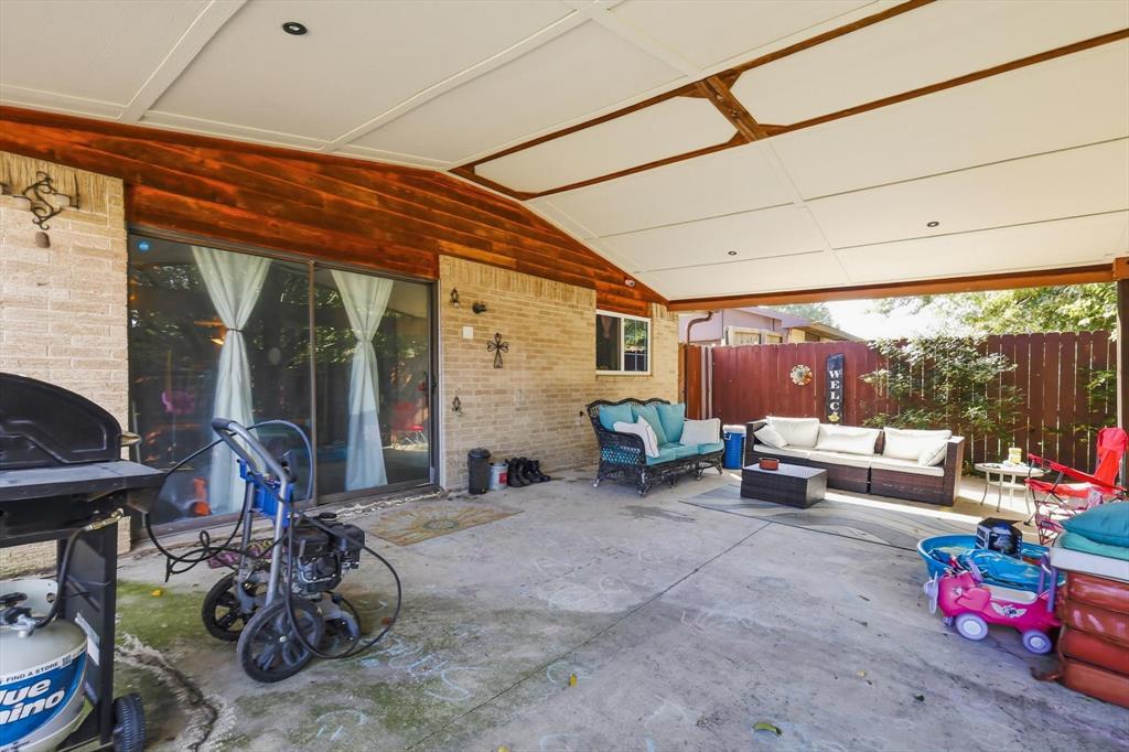 6317 Locust Street Rowlett, TX 75089 - Photo 27 of 40 a room with furniture and a large window