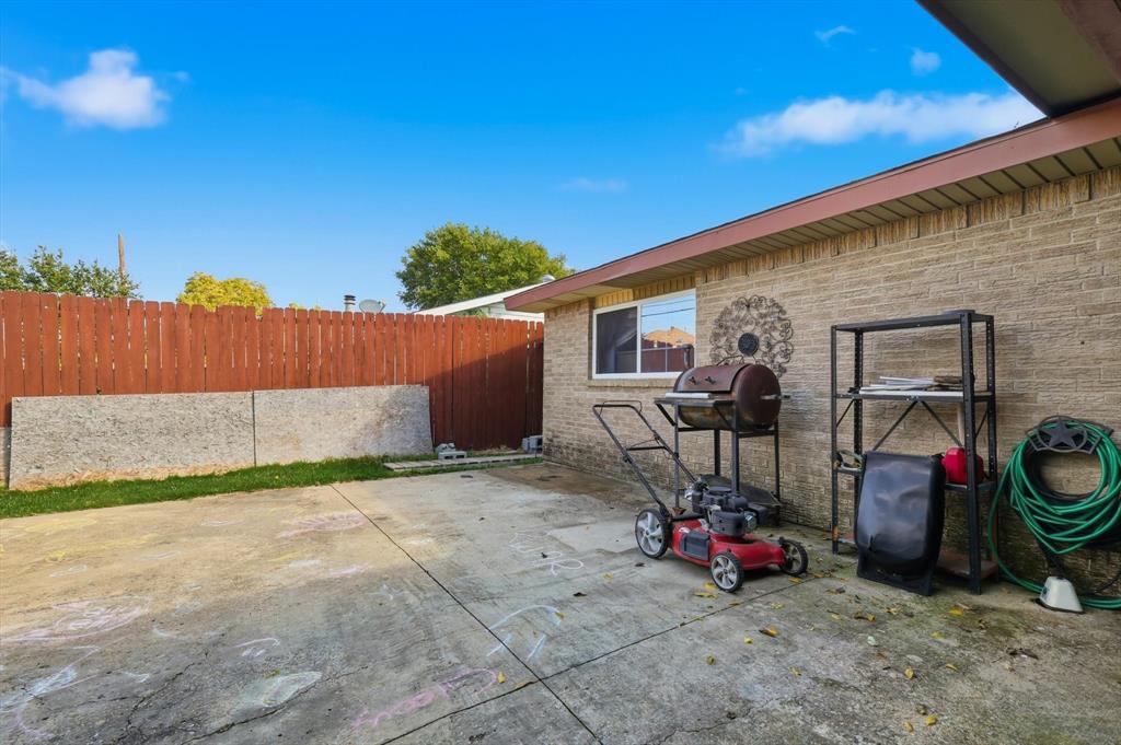 6317 Locust Street Rowlett, TX 75089 - Photo 28 of 40 a view of a storage room with a lot of stuff