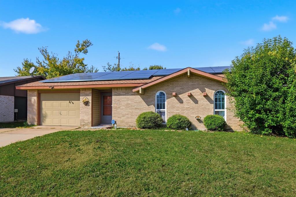 6317 Locust Street Rowlett, TX 75089 - Photo 3 of 40 a view of a house with garden and yard