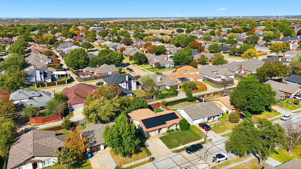 6317 Locust Street Rowlett, TX 75089 - Photo 33 of 40 an aerial view of residential houses with outdoor space