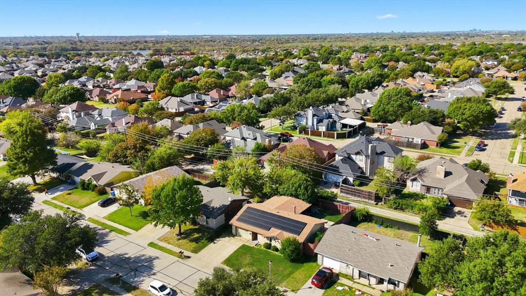 6317 Locust Street Rowlett, TX 75089 - Photo 34 of 40 an aerial view of residential houses with outdoor space