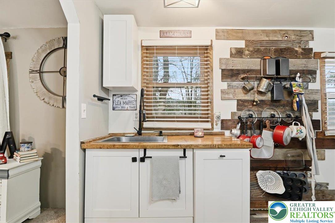 40 Apache Lehighton, PA 18235 - Photo 11 of 32 a kitchen with stainless steel appliances kitchen island granite countertop a sink and cabinets