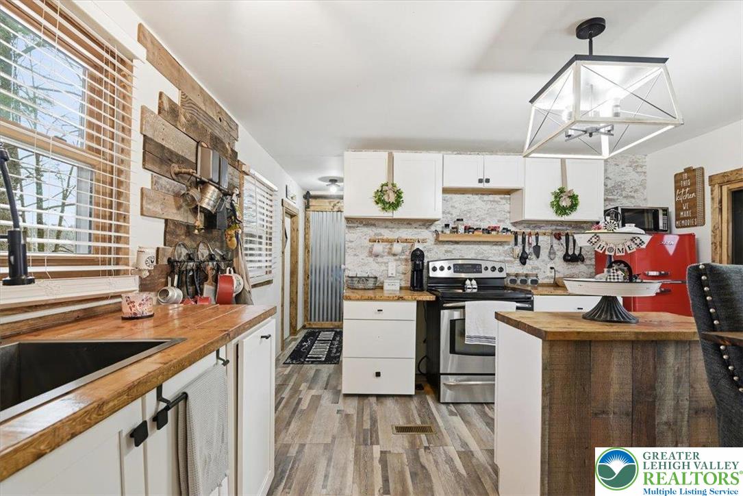 40 Apache Lehighton, PA 18235 - Photo 12 of 32 a kitchen that has a lot of cabinets in it