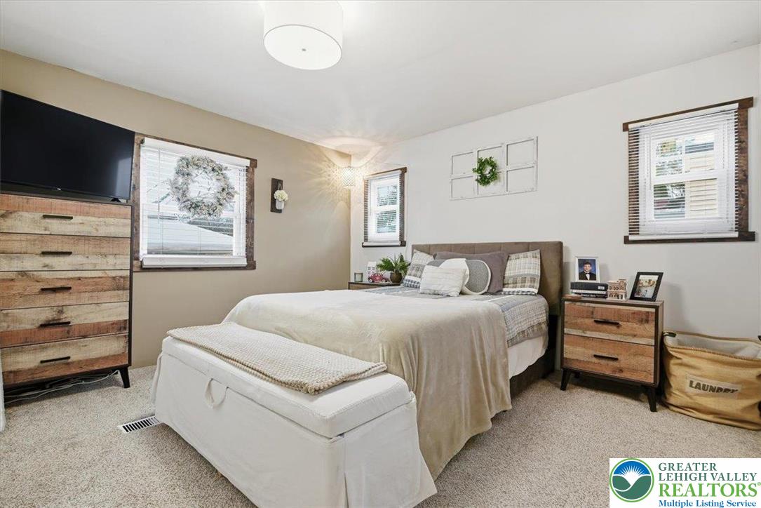 40 Apache Lehighton, PA 18235 - Photo 15 of 32 a bedroom with a bed and a flat screen tv