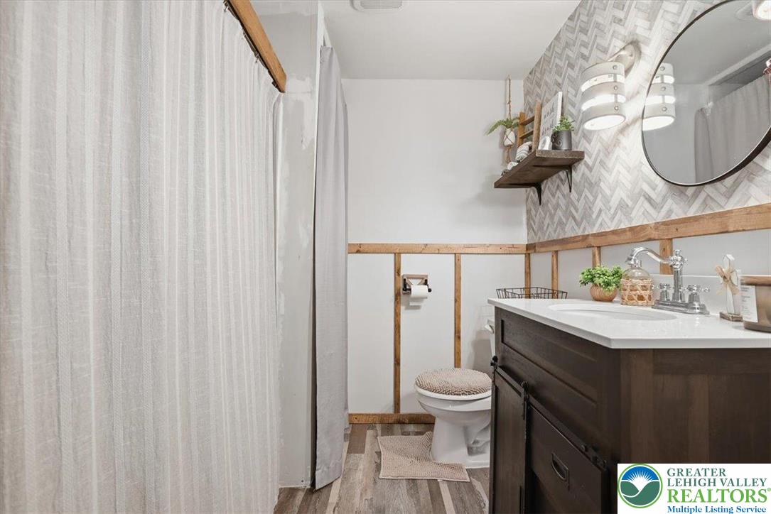 40 Apache Lehighton, PA 18235 - Photo 23 of 32 a bathroom with a sink a toilet and mirror